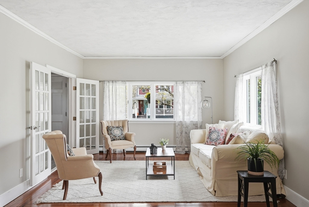 200 Branch Street Mansfield, MA 02048 - Photo 12 of 41 a living room with furniture and a large window