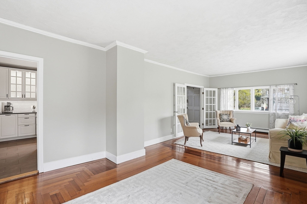 200 Branch Street Mansfield, MA 02048 - Photo 13 of 41 a living room with furniture wooden floor and a rug