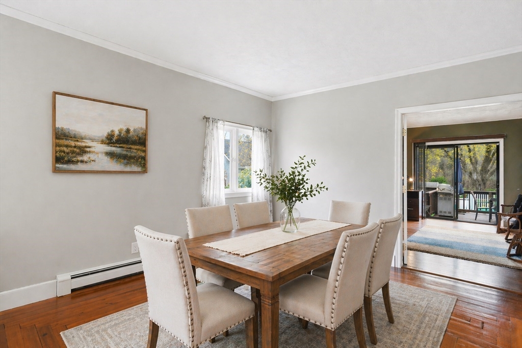 200 Branch Street Mansfield, MA 02048 - Photo 15 of 41 a view of a dining room with furniture window and wooden floor