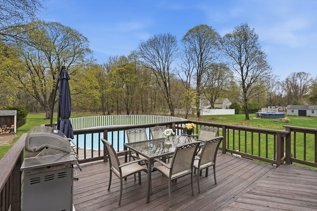 200 Branch Street Mansfield, MA 02048 - Photo 34 of 41 a view of a deck with mountain view and wooden floor
