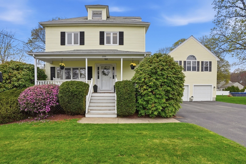 200 Branch Street Mansfield, MA 02048 - Photo 39 of 41 a front view of a house with a garden