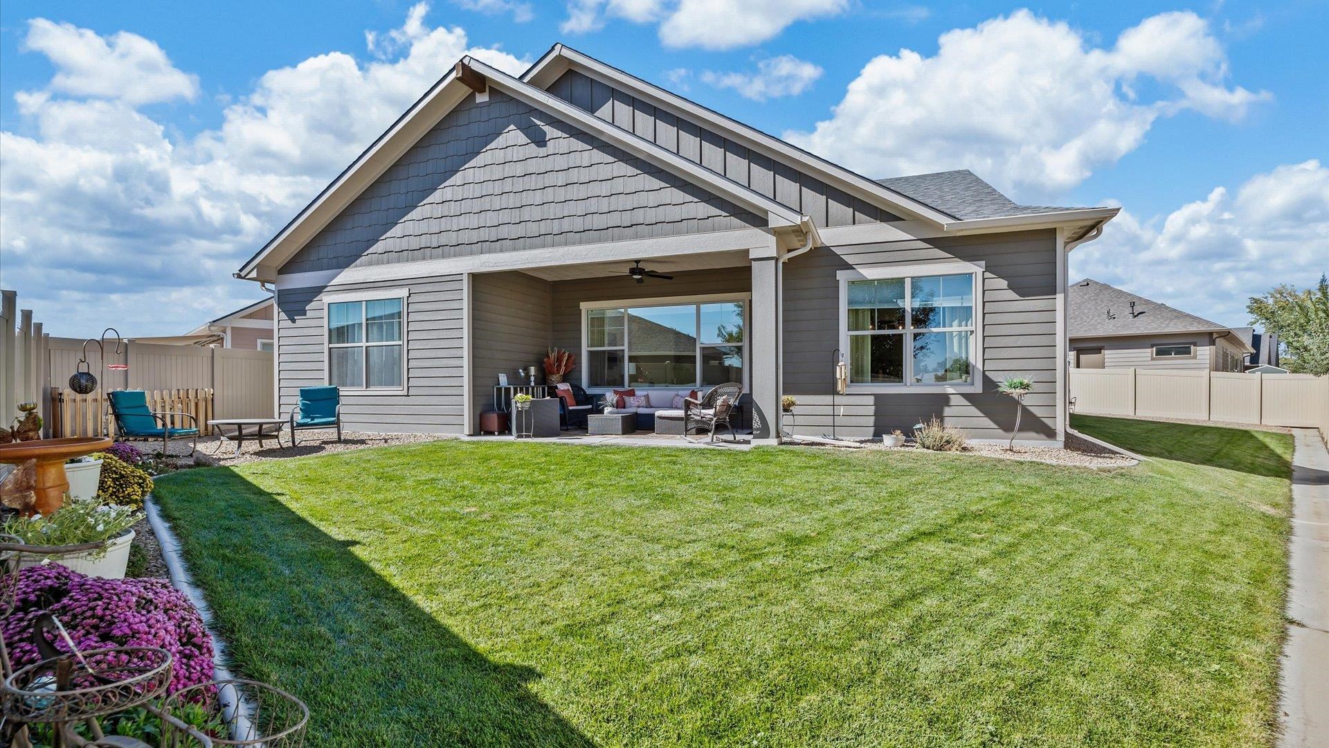 786 Spur Cross Road Grand Junction, CO 81505 - Photo 25 of 27 a view of a house with backyard porch and garden