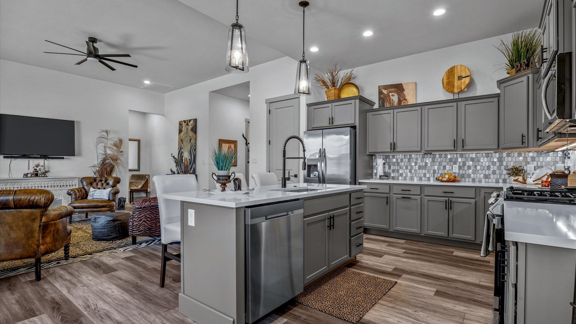 786 Spur Cross Road Grand Junction, CO 81505 - Photo 8 of 27 a kitchen with cabinets a sink and appliances