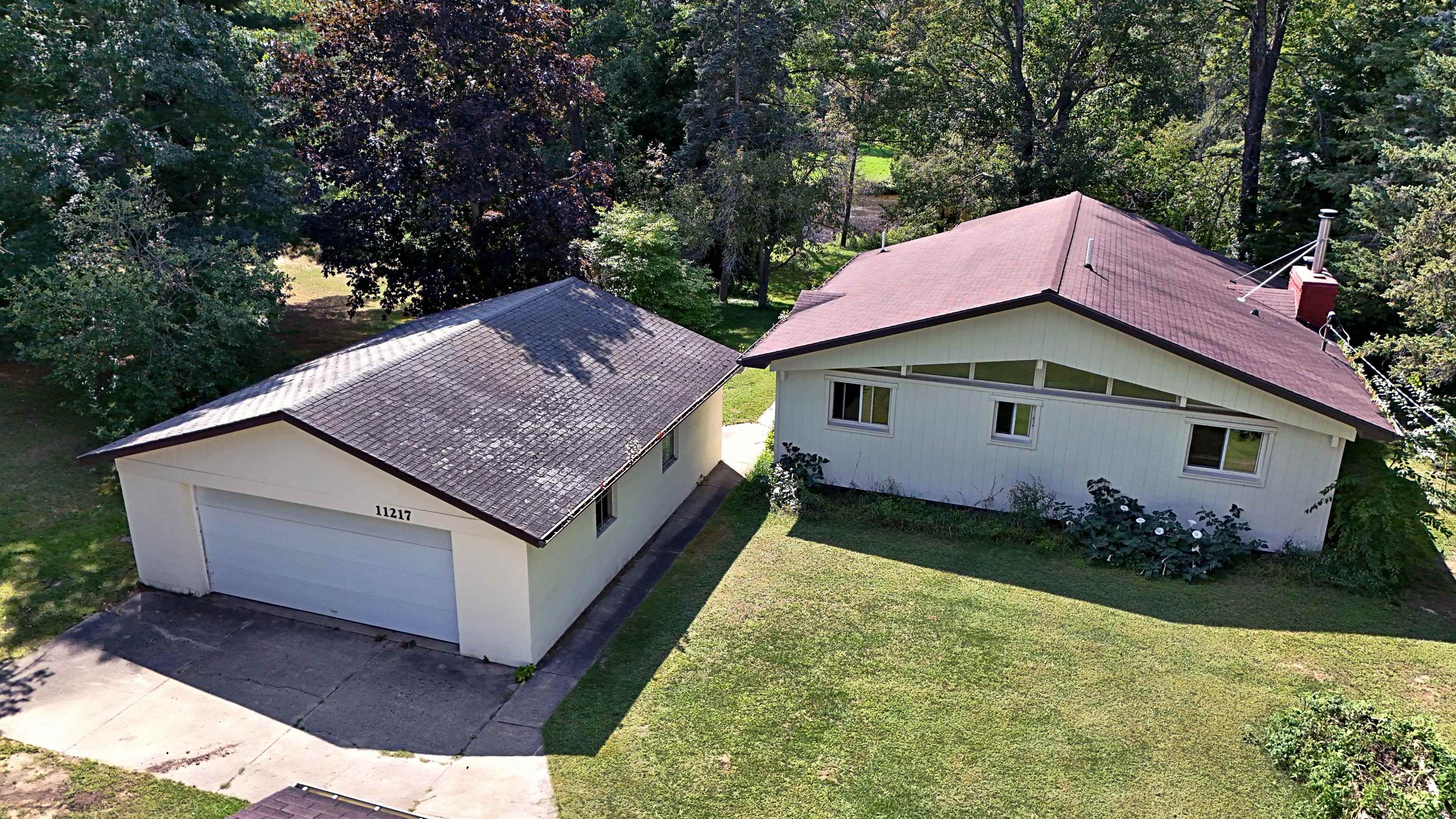 11217 Clam River Road Marion, MI 49665 - Photo 5 of 53 1926211-20fd3a64-b274-4349-a911-84f3bd182585.JPG