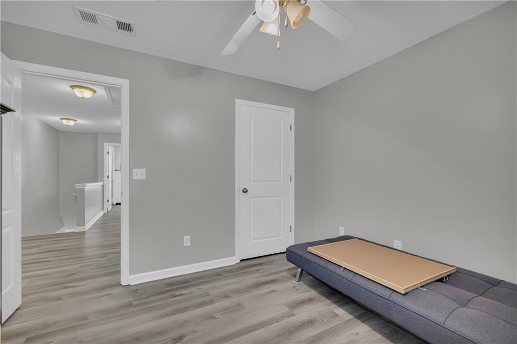 1498 Box Circle Winder, GA 30680 - Photo 32 of 56 a room with wooden floor and pool