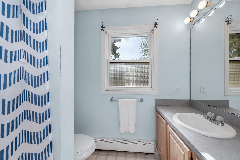 7 Marie Street Methuen, MA 01844 - Photo 25 of 39 a bathroom with a sink and a mirror