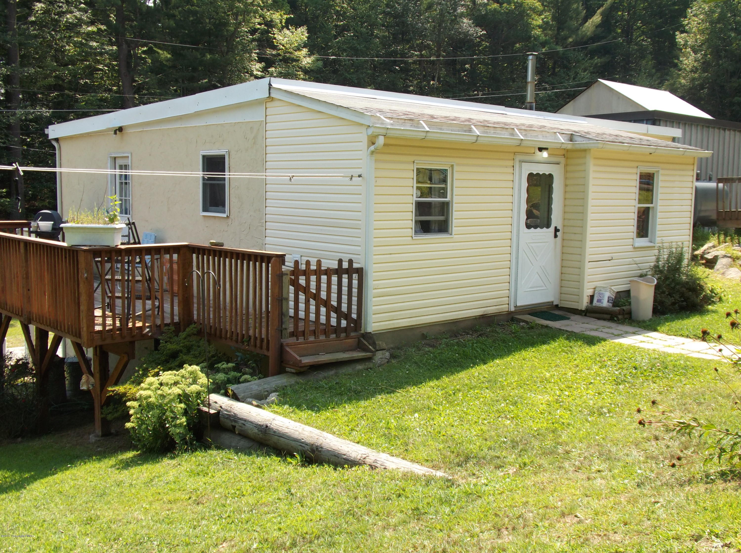 148 Rinker Drive Effort, PA 18330 - Photo 8 of 52 a house view with a garden space