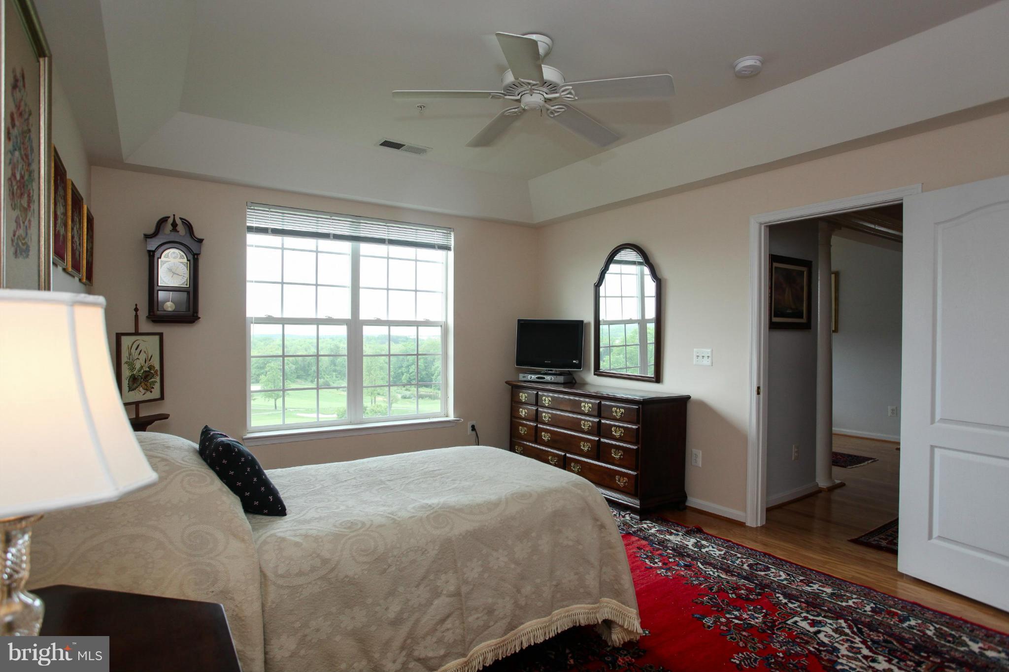 7325 Brookview Road, Unit 406 Elkridge, MD 21075 - Photo 15 of 25 Large master bedroom with view of golf course