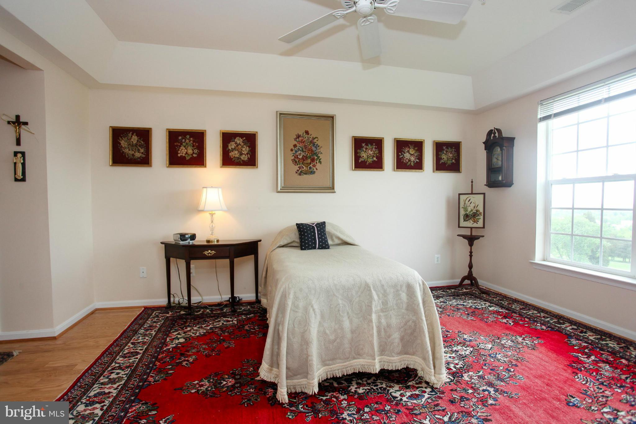 7325 Brookview Road, Unit 406 Elkridge, MD 21075 - Photo 16 of 25 Master with tray ceilings and wood floors