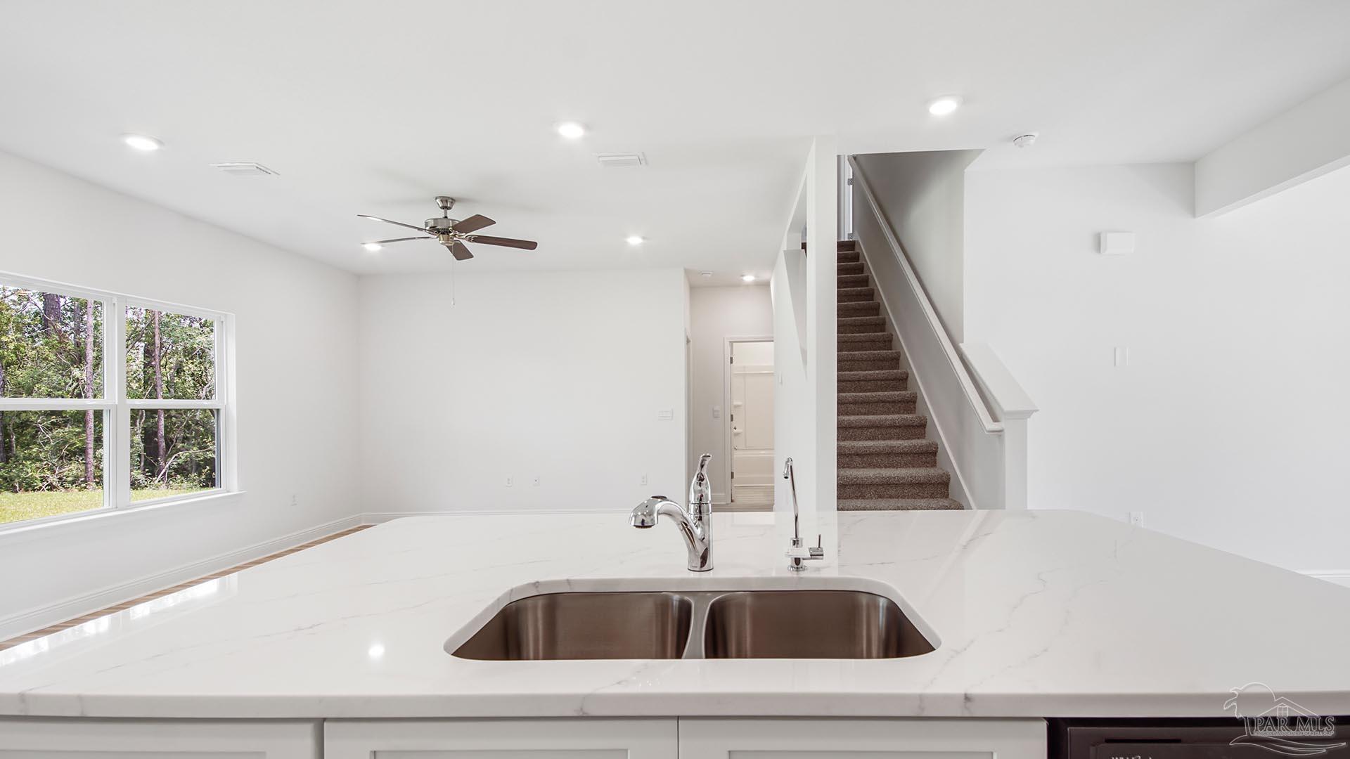 3233 Harrier Road Pace, FL 32571 - Photo 36 of 50 a bathroom with a sink and a bathtub