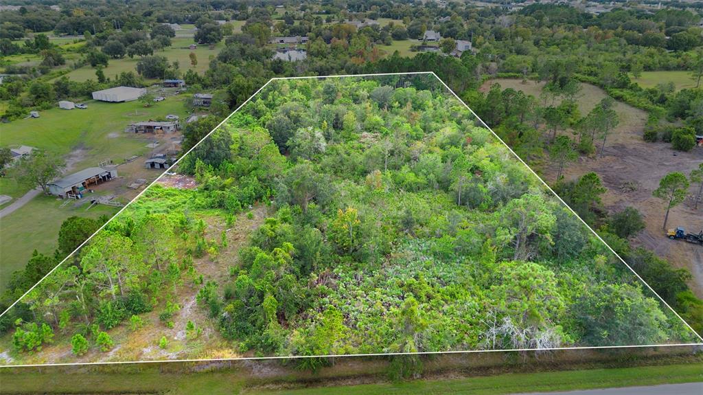 High Plains Lane Kissimmee, FL 34744 - Photo 2 of 4 an aerial view of a yard