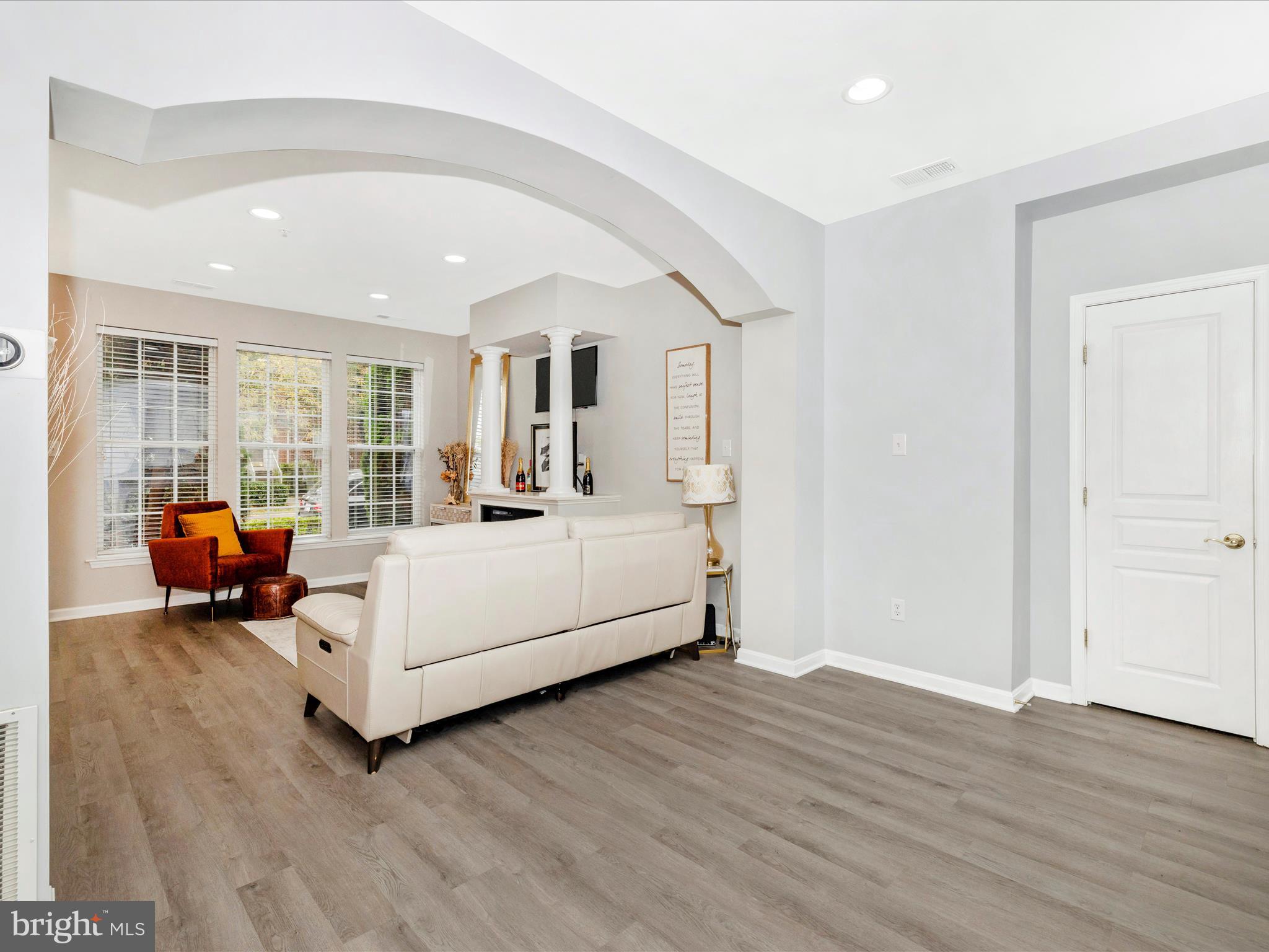 1813 Wheyfield Drive, Unit 10A Frederick, MD 21701 - Photo 11 of 50 a room with a bed and a large window with outer view