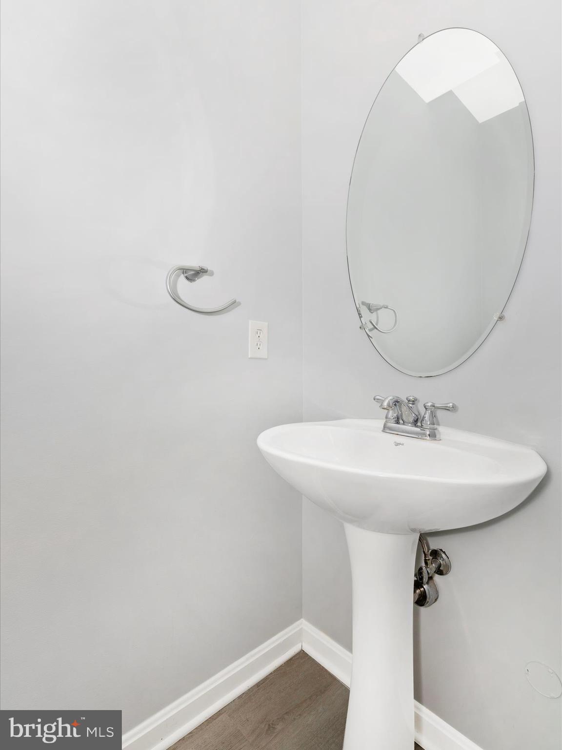 1813 Wheyfield Drive, Unit 10A Frederick, MD 21701 - Photo 16 of 50 a bathroom with a sink and mirror