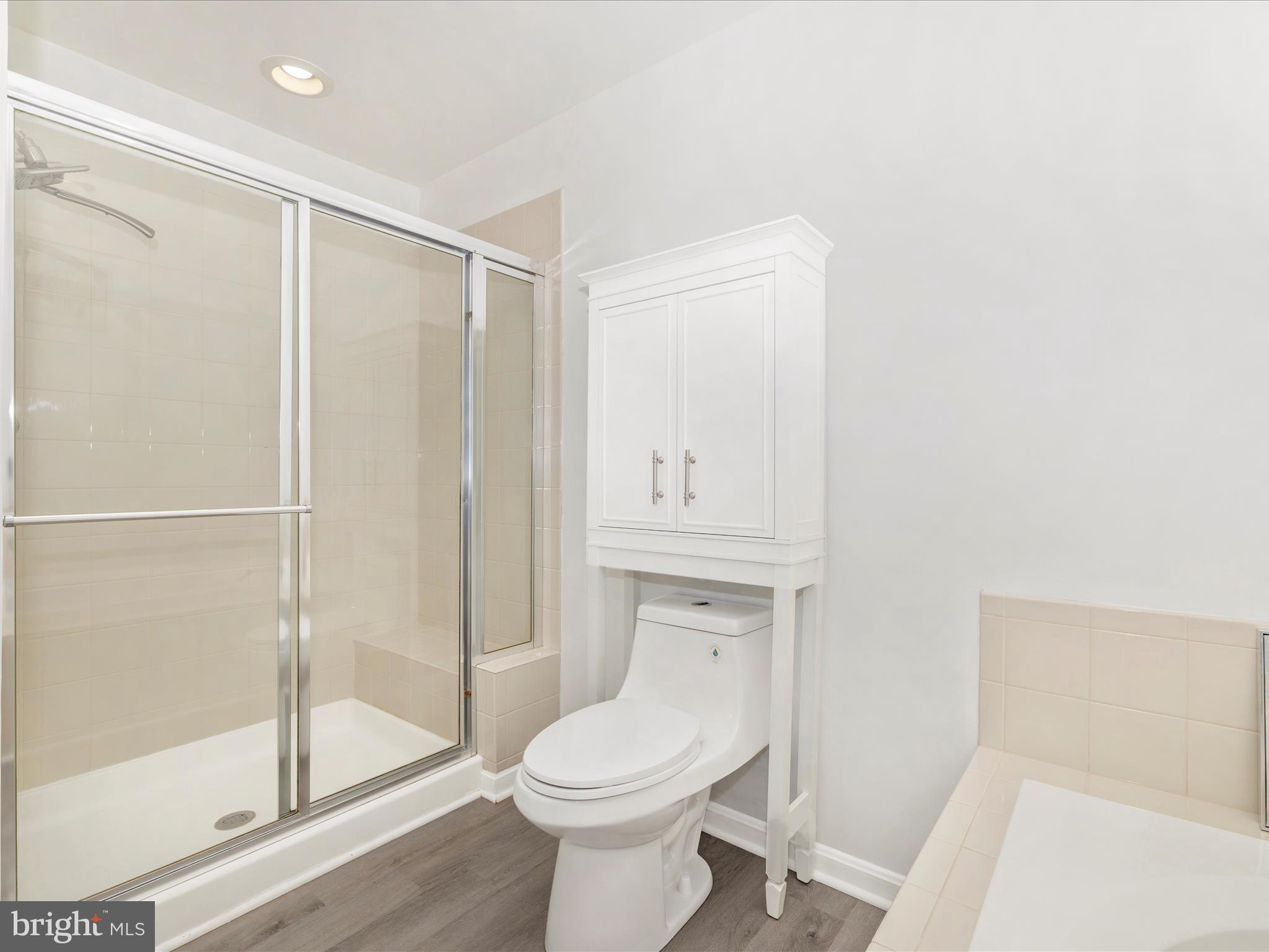 1813 Wheyfield Drive, Unit 10A Frederick, MD 21701 - Photo 25 of 50 a bathroom with a toilet and a shower