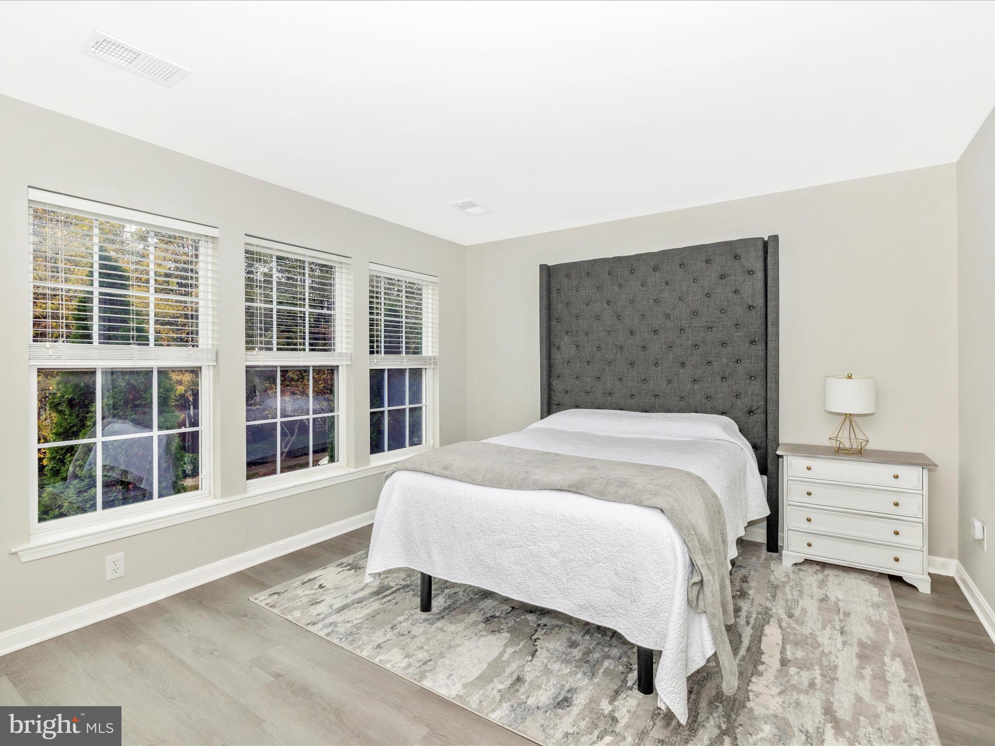 1813 Wheyfield Drive, Unit 10A Frederick, MD 21701 - Photo 26 of 50 a bedroom with a bed and a window