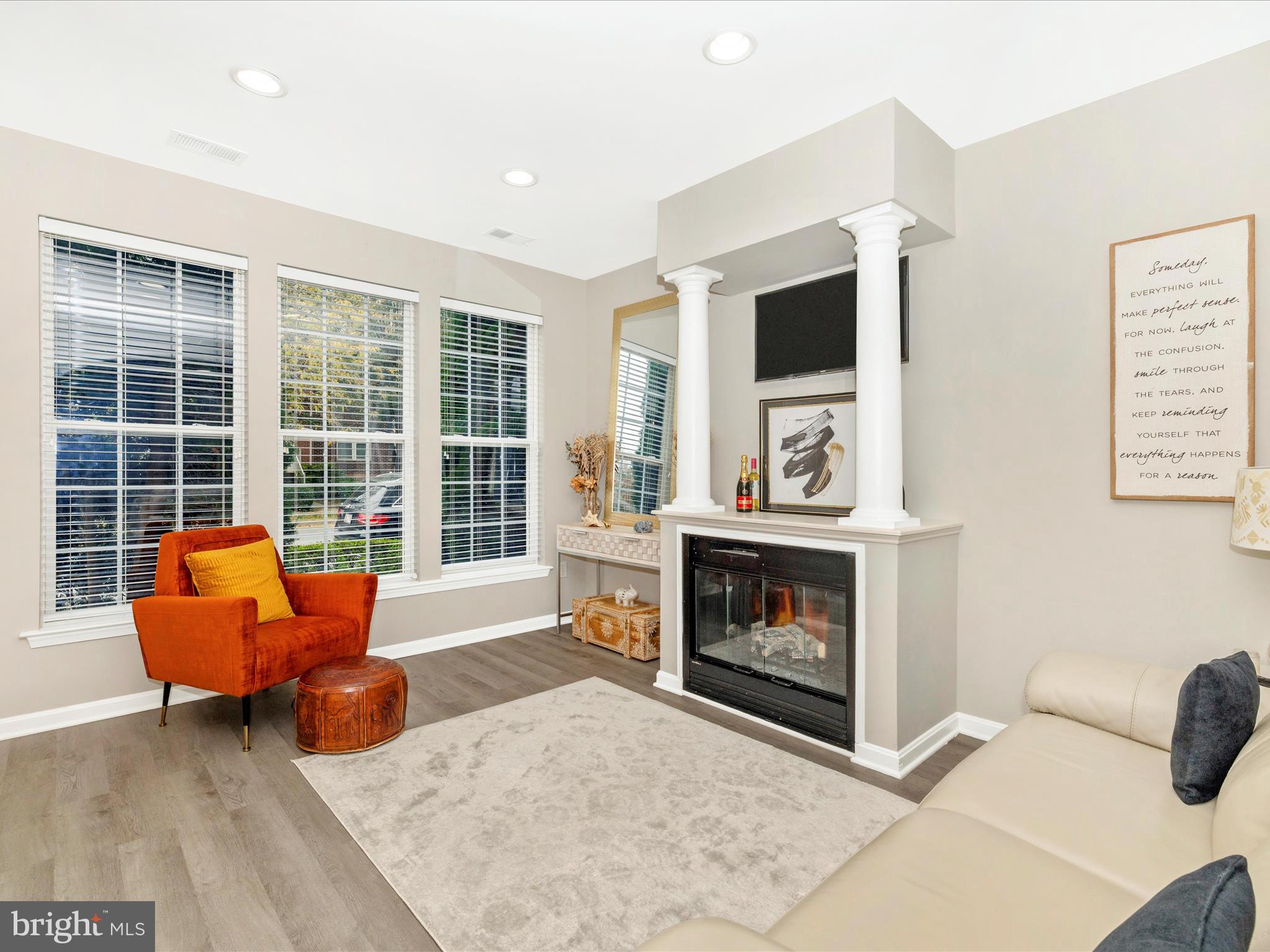 1813 Wheyfield Drive, Unit 10A Frederick, MD 21701 - Photo 6 of 50 a living room with furniture and a fireplace