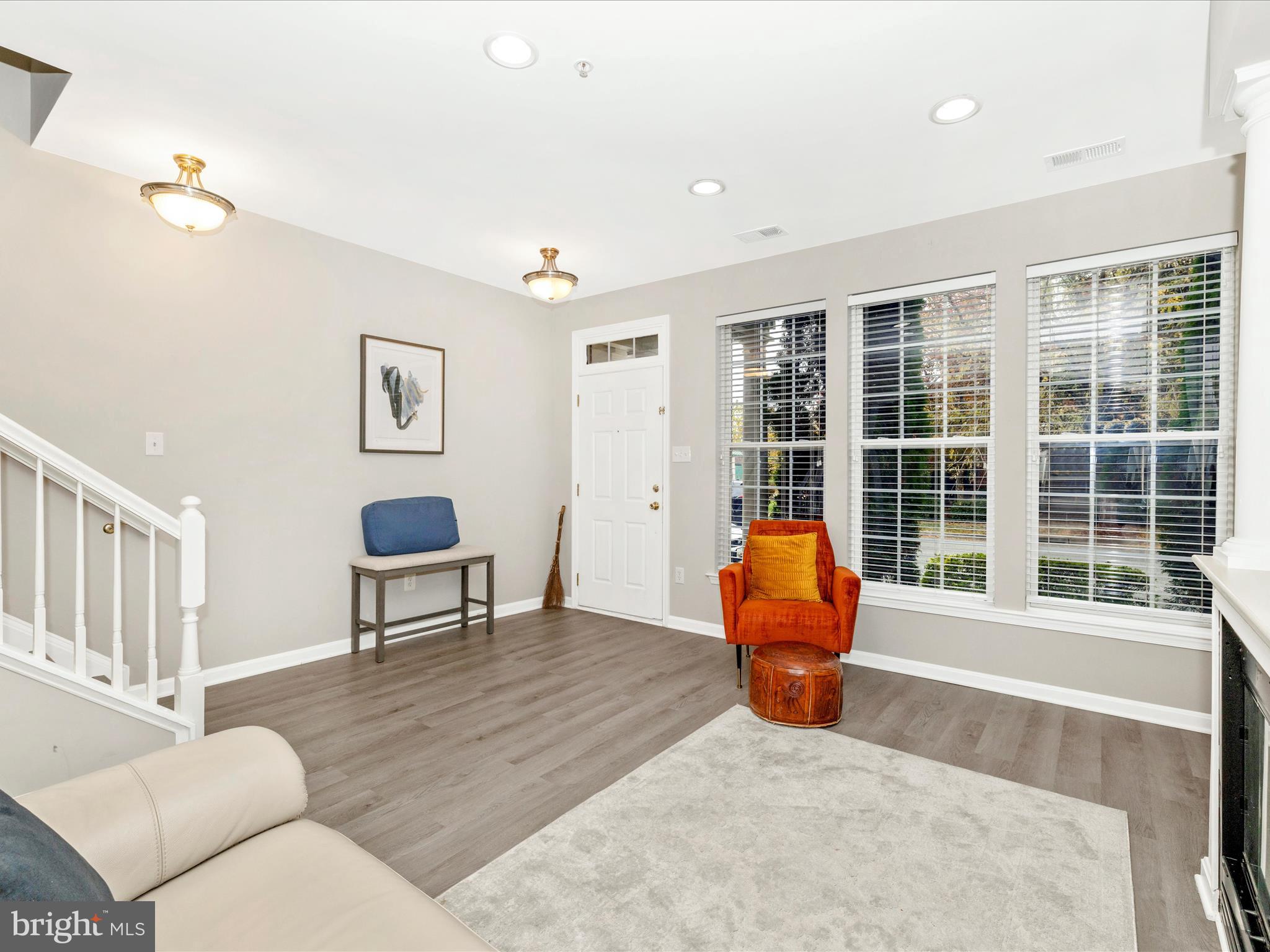 1813 Wheyfield Drive, Unit 10A Frederick, MD 21701 - Photo 7 of 50 a living room with furniture and a window