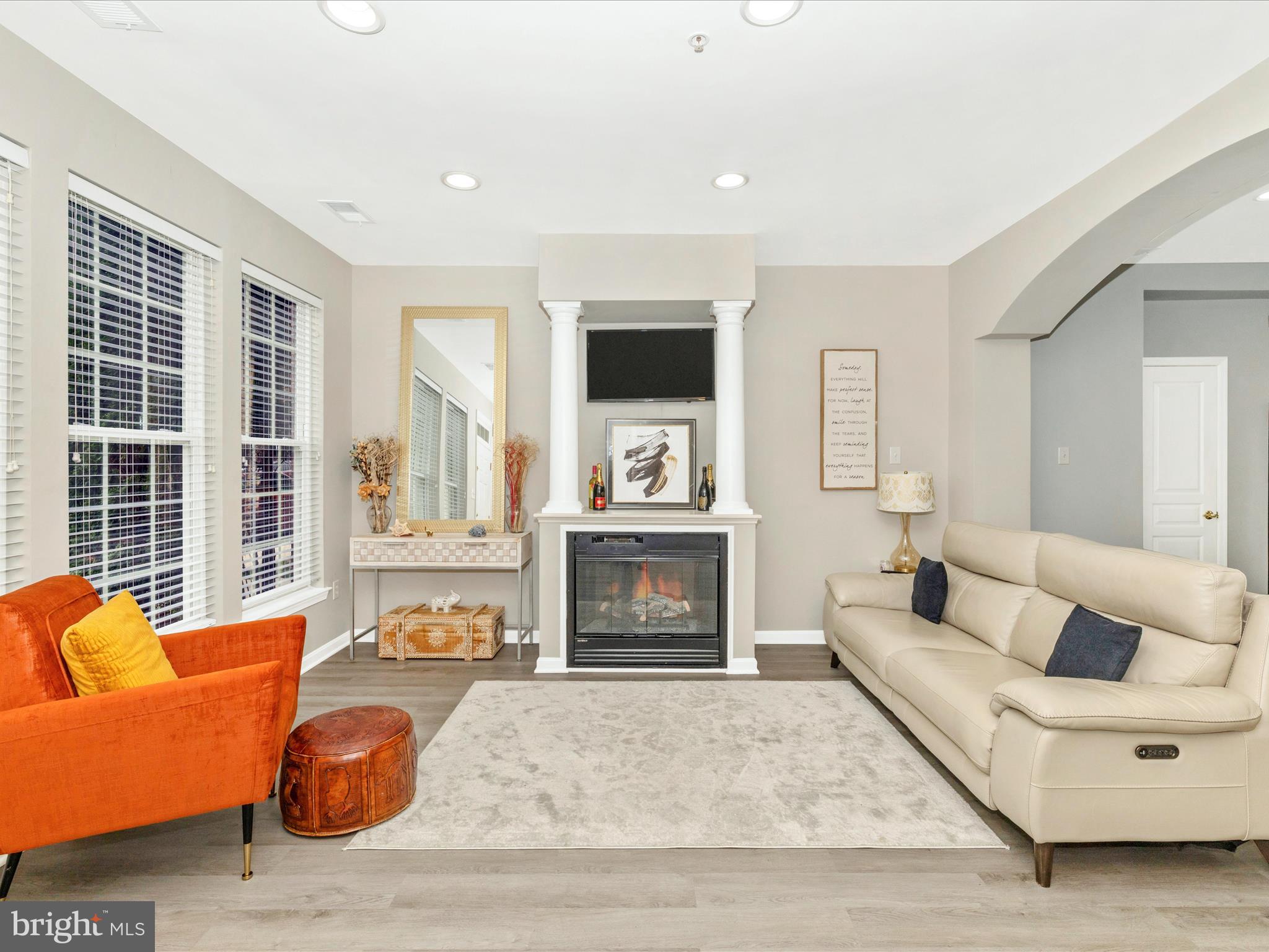 1813 Wheyfield Drive, Unit 10A Frederick, MD 21701 - Photo 9 of 50 a living room with furniture fireplace and window