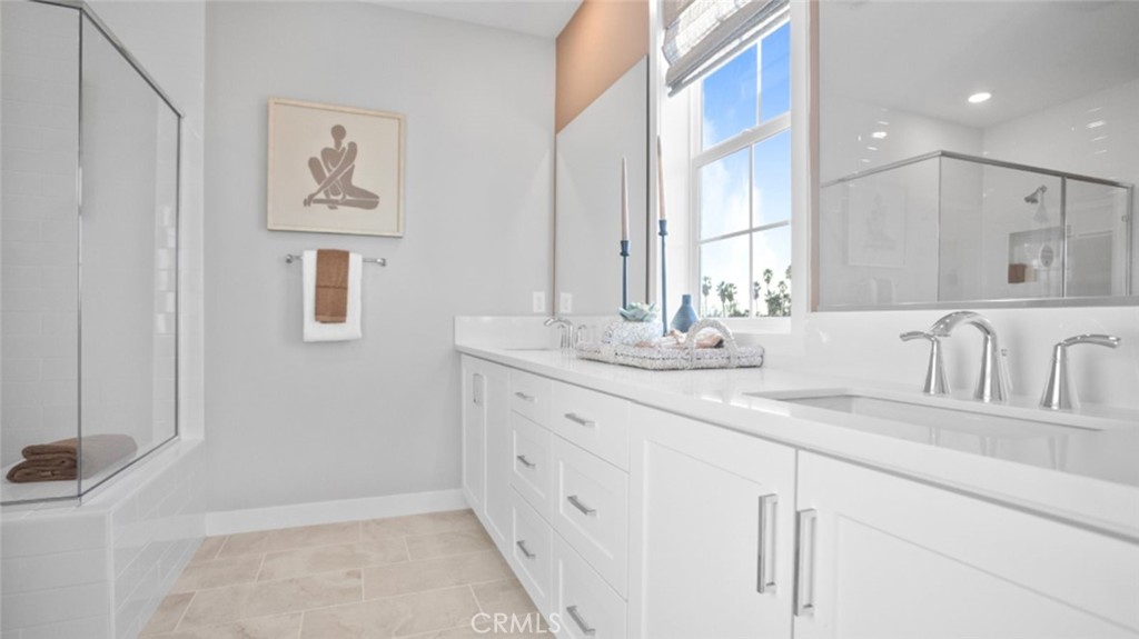 1074 North Anaheim Boulevard, Unit 2 Anaheim, CA 92801 - Photo 12 of 21 a bathroom with a sink and a mirror
