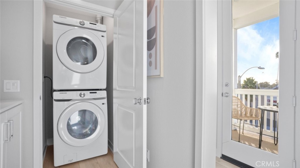 1074 North Anaheim Boulevard, Unit 2 Anaheim, CA 92801 - Photo 18 of 21 a view of a hallway with washer and dryer
