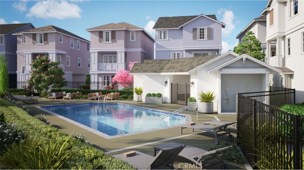 1074 North Anaheim Boulevard, Unit 2 Anaheim, CA 92801 - Photo 20 of 21 a view of a house with pool and chairs