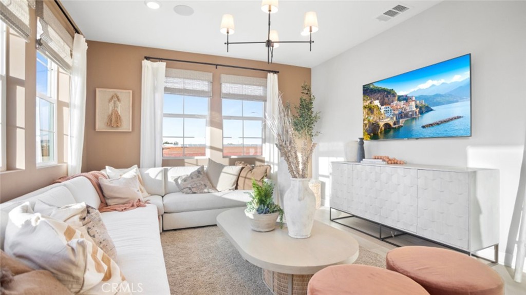1074 North Anaheim Boulevard, Unit 2 Anaheim, CA 92801 - Photo 7 of 21 a living room with furniture and a large window