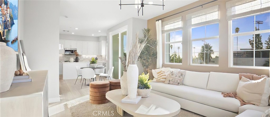 1074 North Anaheim Boulevard, Unit 2 Anaheim, CA 92801 - Photo 9 of 21 a living room with furniture and a large window