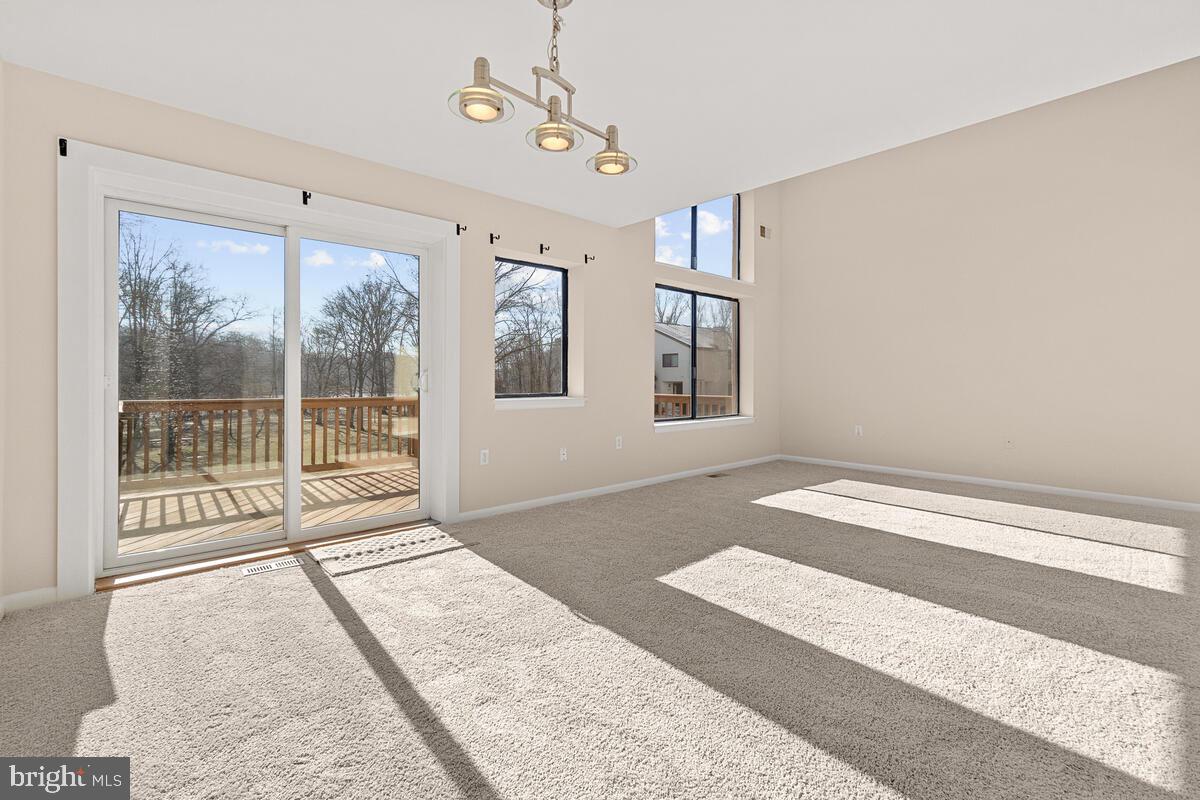 5689 Vantage Point Road Columbia, MD 21044 - Photo 13 of 41 Dining area with door to deck