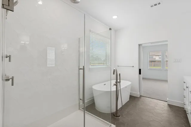 a bathroom with a double vanity sink and mirror