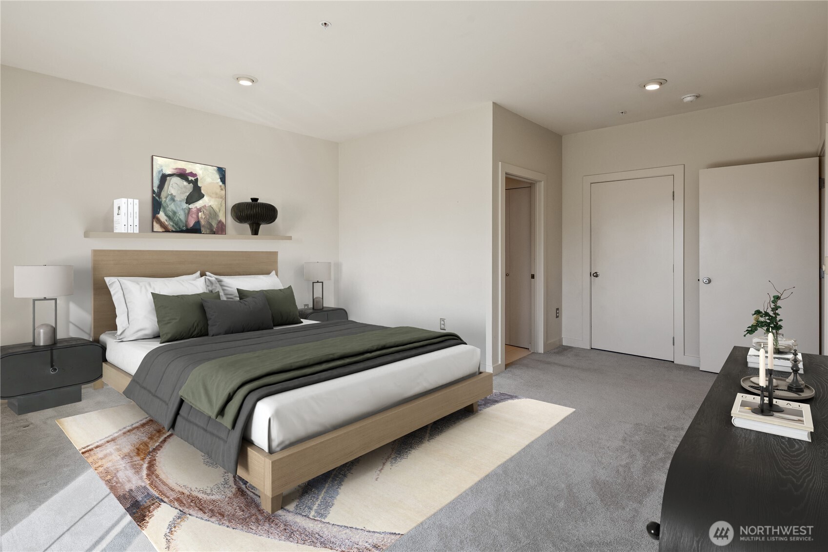 700 East Denny Way, Unit 603 Seattle, WA 98122 - Photo 17 of 37 a bedroom with bed and night stand