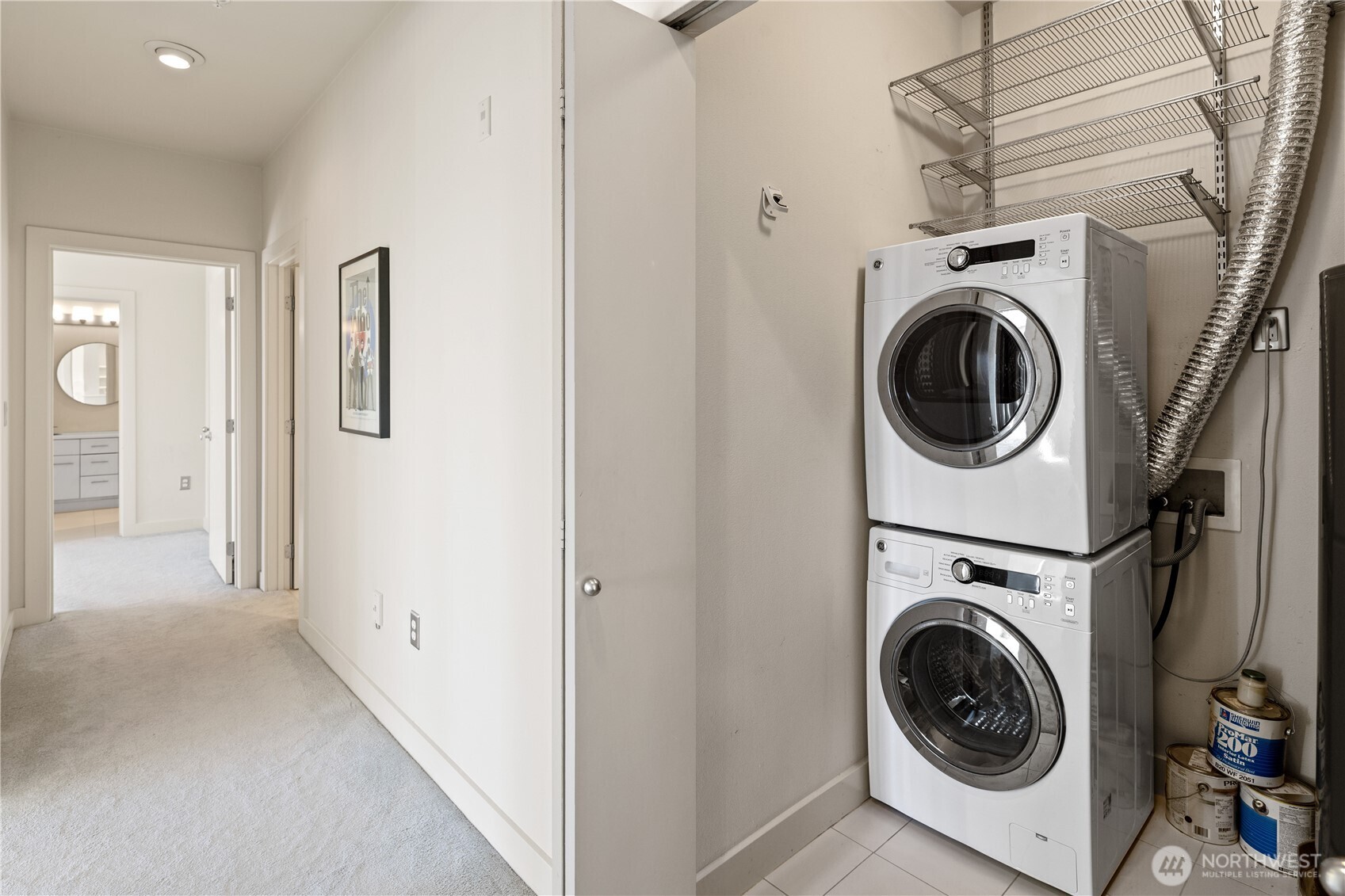 700 East Denny Way, Unit 603 Seattle, WA 98122 - Photo 25 of 37 a utility room with dryer and washer