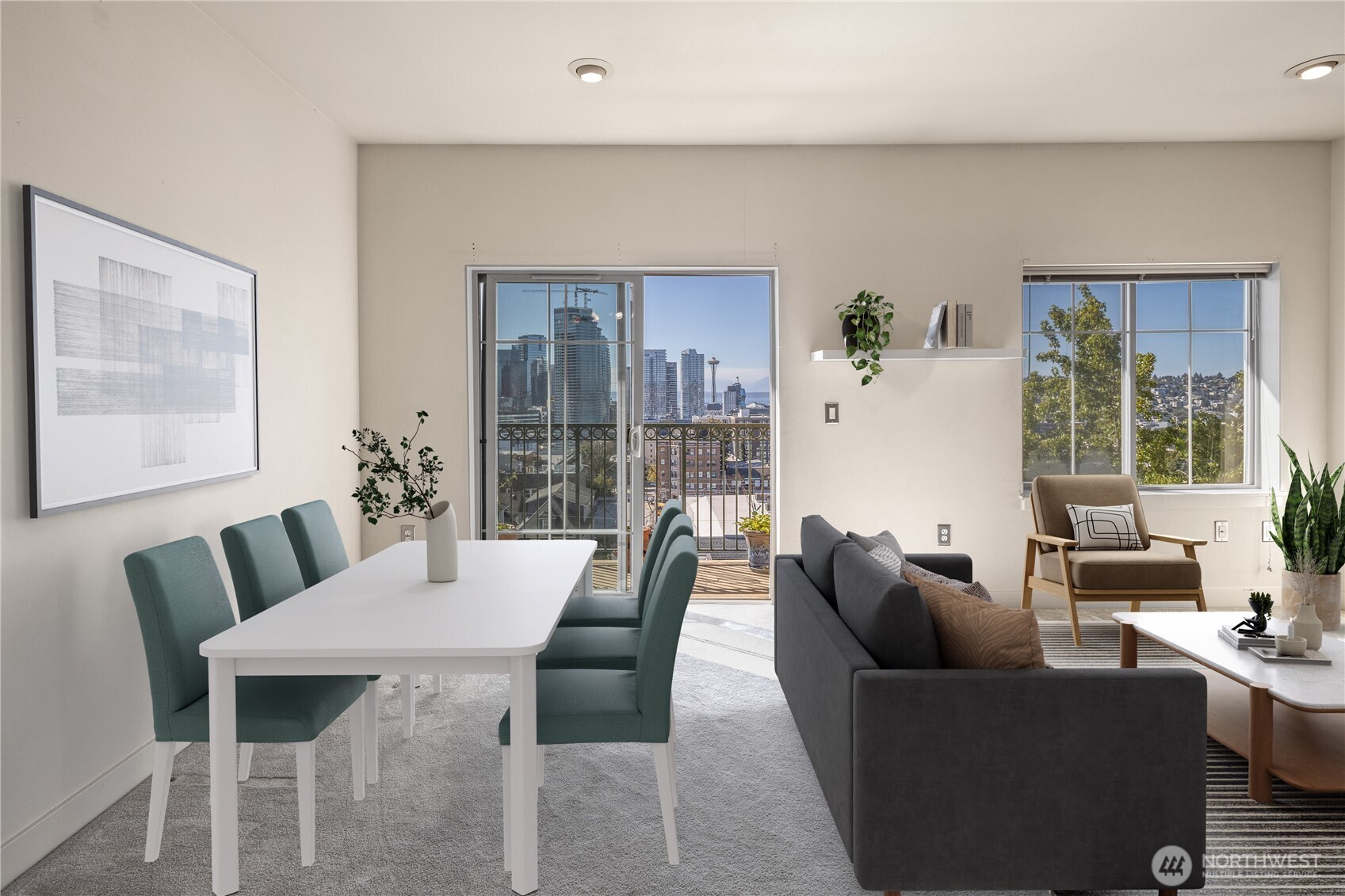 700 East Denny Way, Unit 603 Seattle, WA 98122 - Photo 9 of 37 a view of a dining room with furniture window and outside view