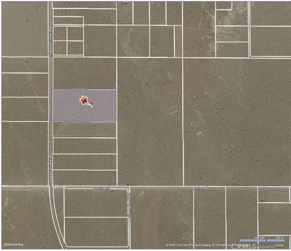 a view of a room with a door and a window