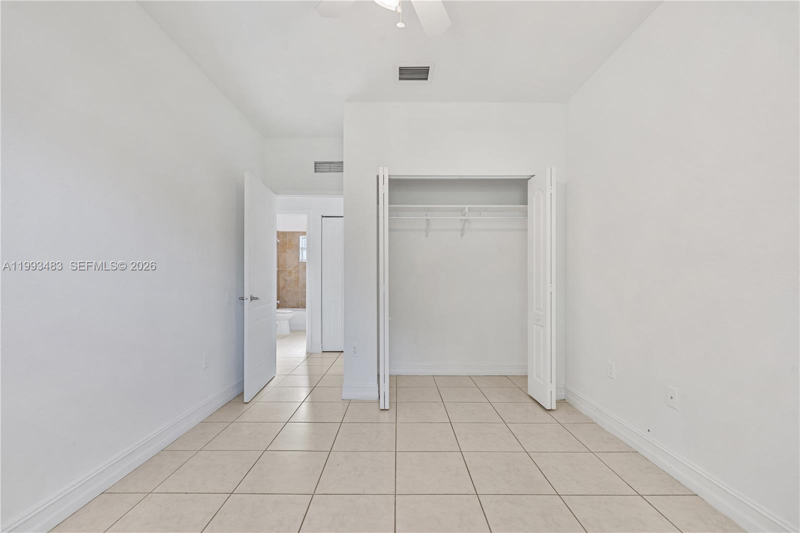 10357 Southwest 178th Street, Unit 10357 Miami, FL 33157 - Photo 16 of 25 a view of an empty room
