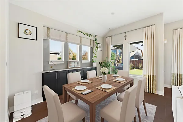 a kitchen with granite countertop stainless steel appliances and wooden cabinets