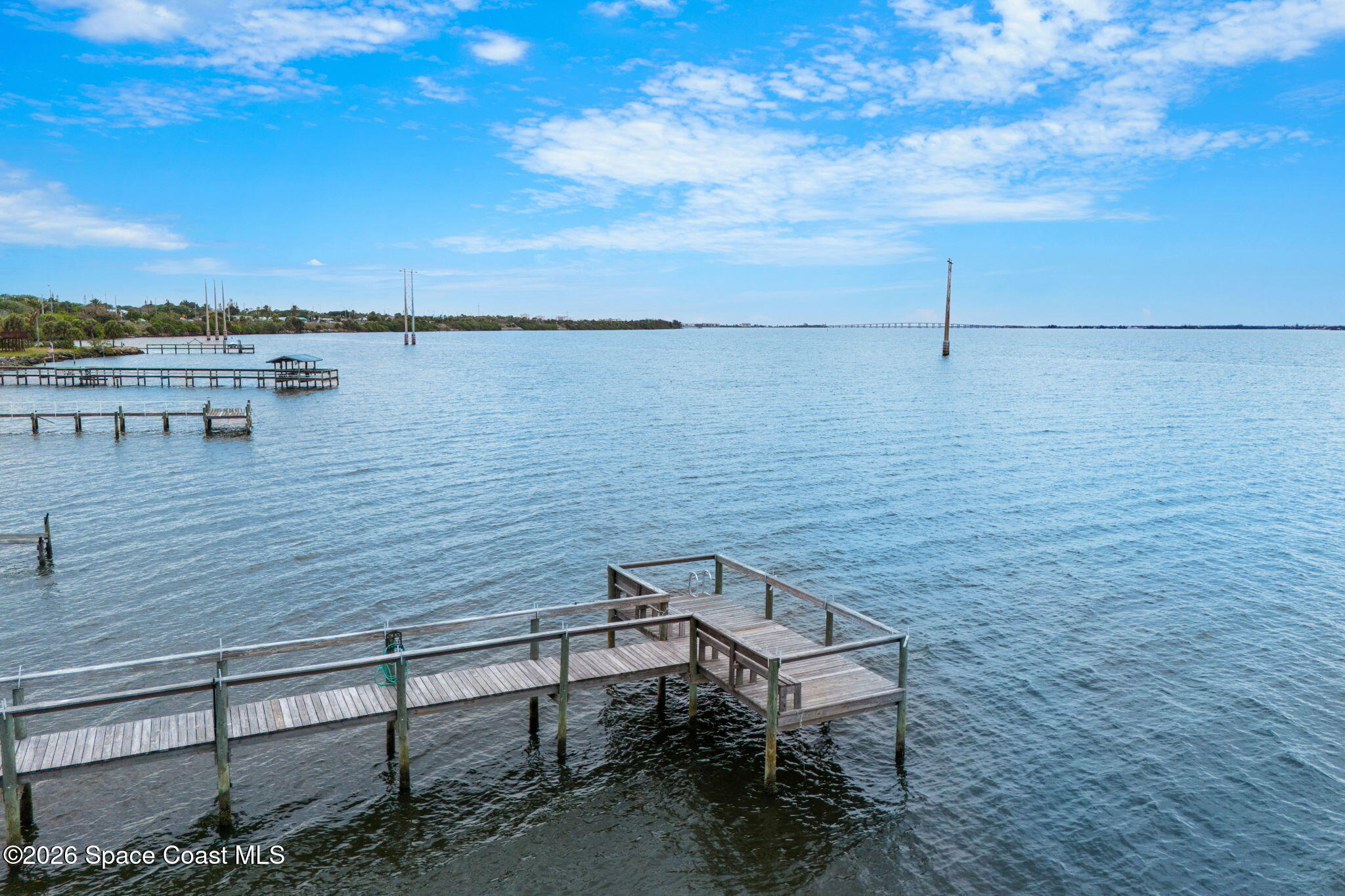 3121 Kirkland Road Northeast Palm Bay, FL 32905 - Photo 39 of 52 a view of a lake and outdoor seating