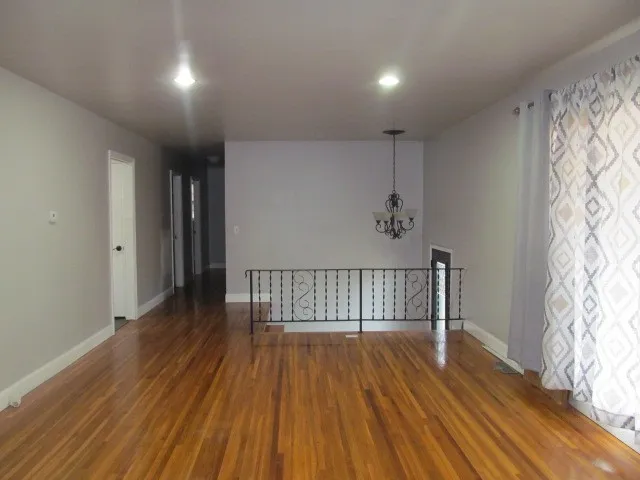 a view of entryway with wooden floor