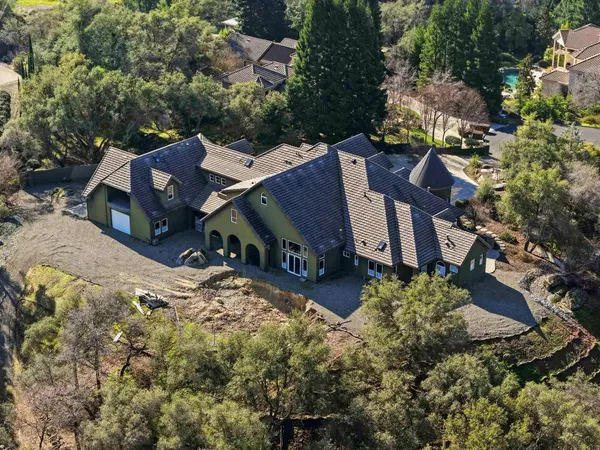 a view of a house with a street