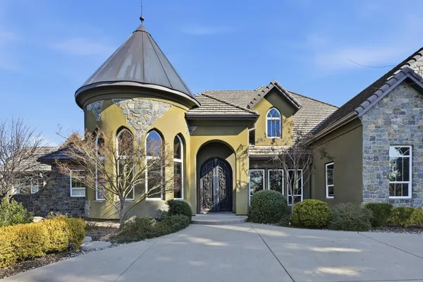 a view of a road with trees in the background