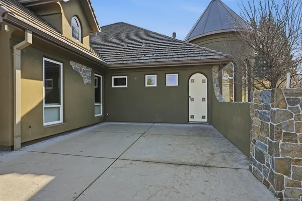 a view of the room with wooden ceiling