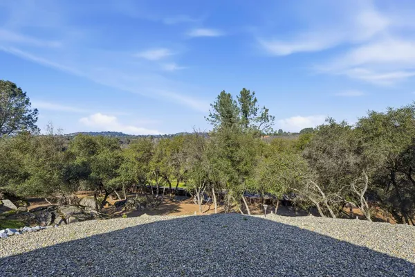 a view of an empty room with wooden walls