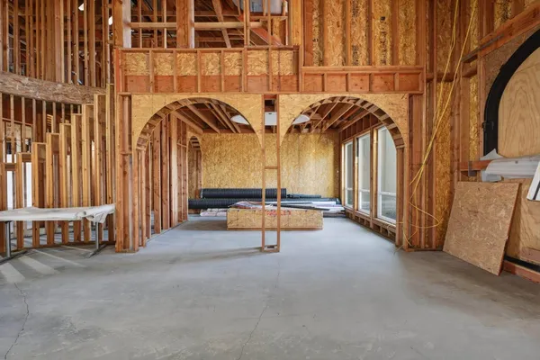 a view of a room with wooden walls