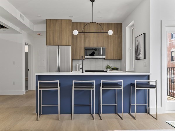 27 Dixwell Street, Unit 12 Boston, MA 02119 - Photo 4 of 21