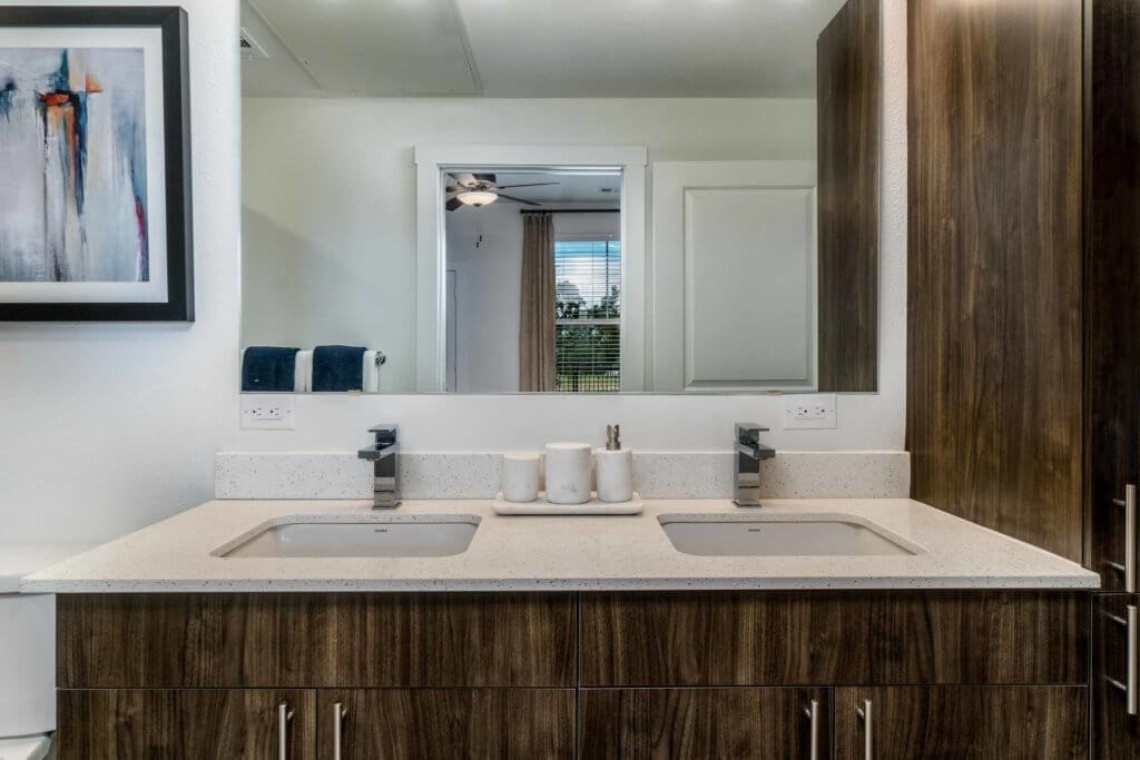 11250 Mason Road, Unit 4125 Cypress, TX 77433 - Photo 8 of 13 a bathroom with a sink and a mirror