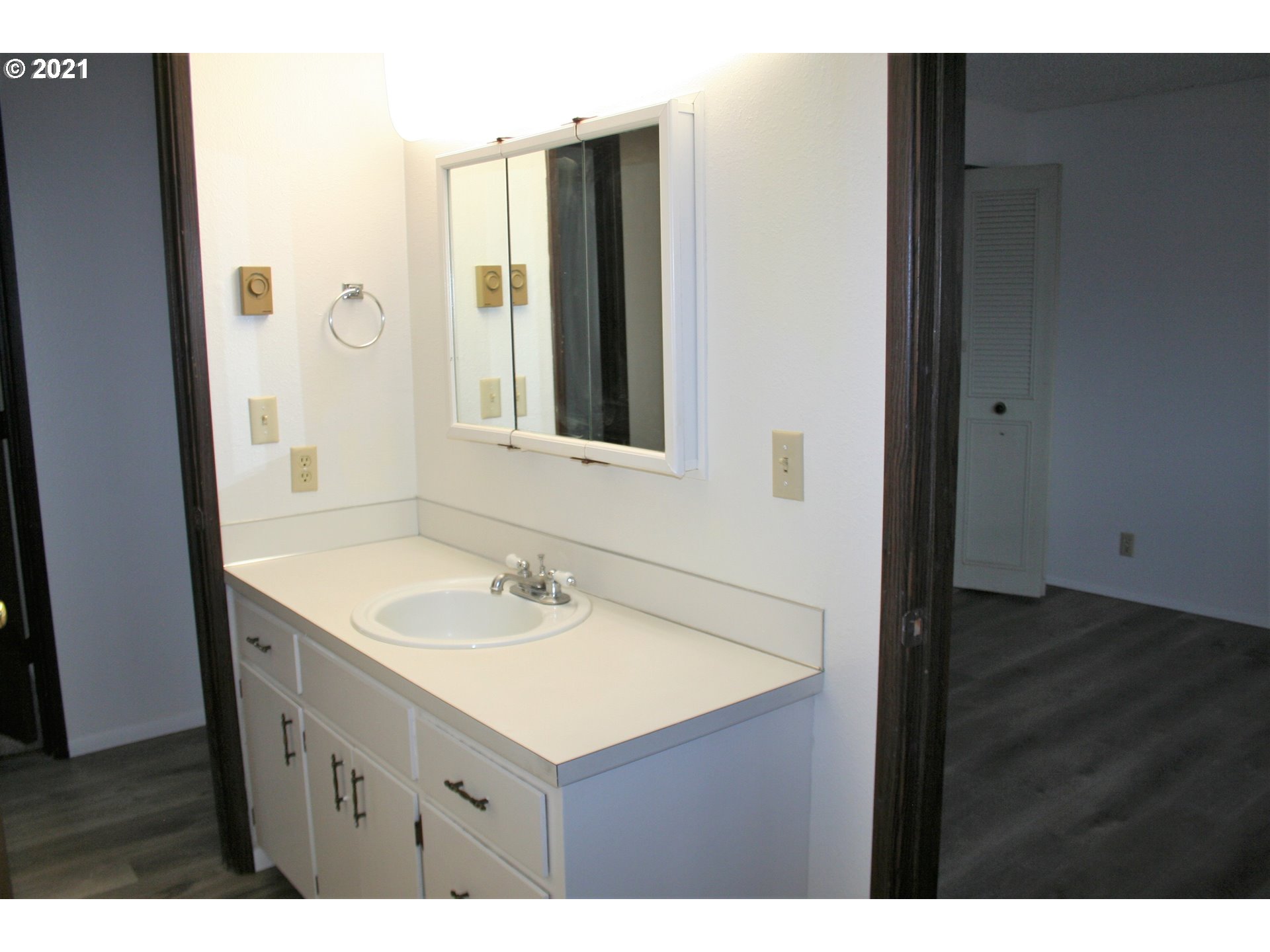 1167 T Street Springfield, OR 97477 - Photo 14 of 16 a bathroom with a sink and a mirror