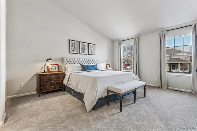 a bedroom with a bed and a cabinets