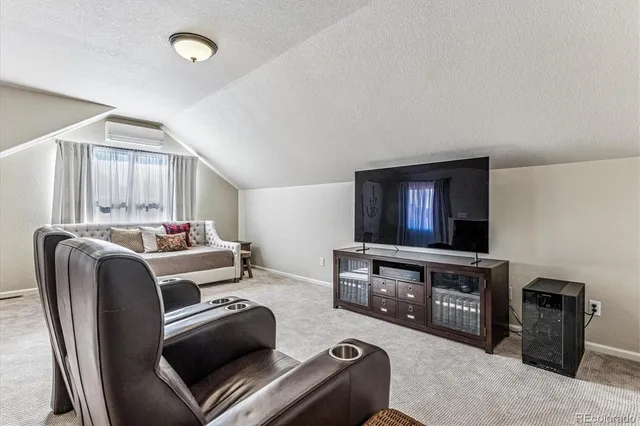 a room with furniture and a window