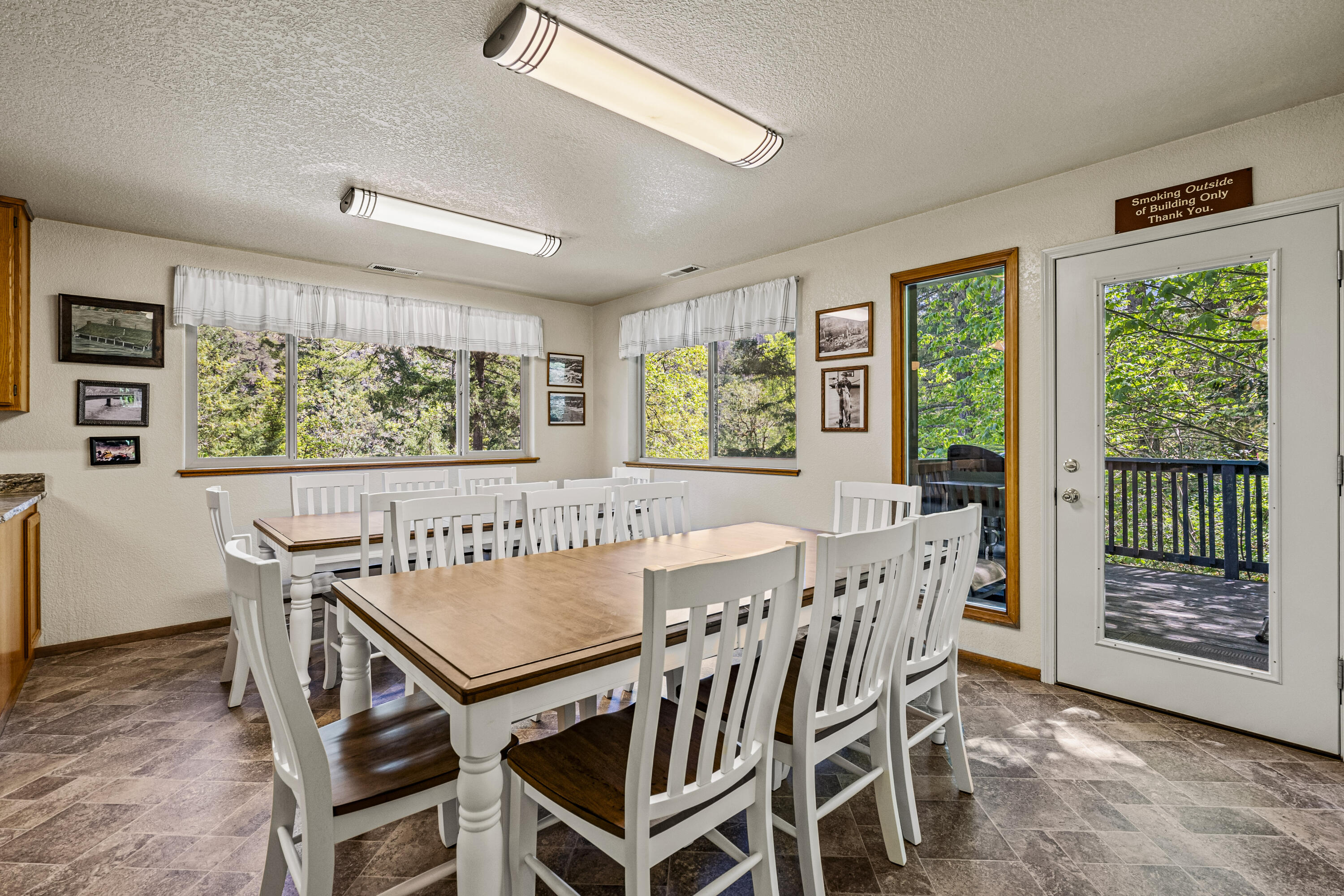 11744 Galice Road Merlin, OR 97532 - Photo 23 of 74 a view of a dining room with furniture window and outside view