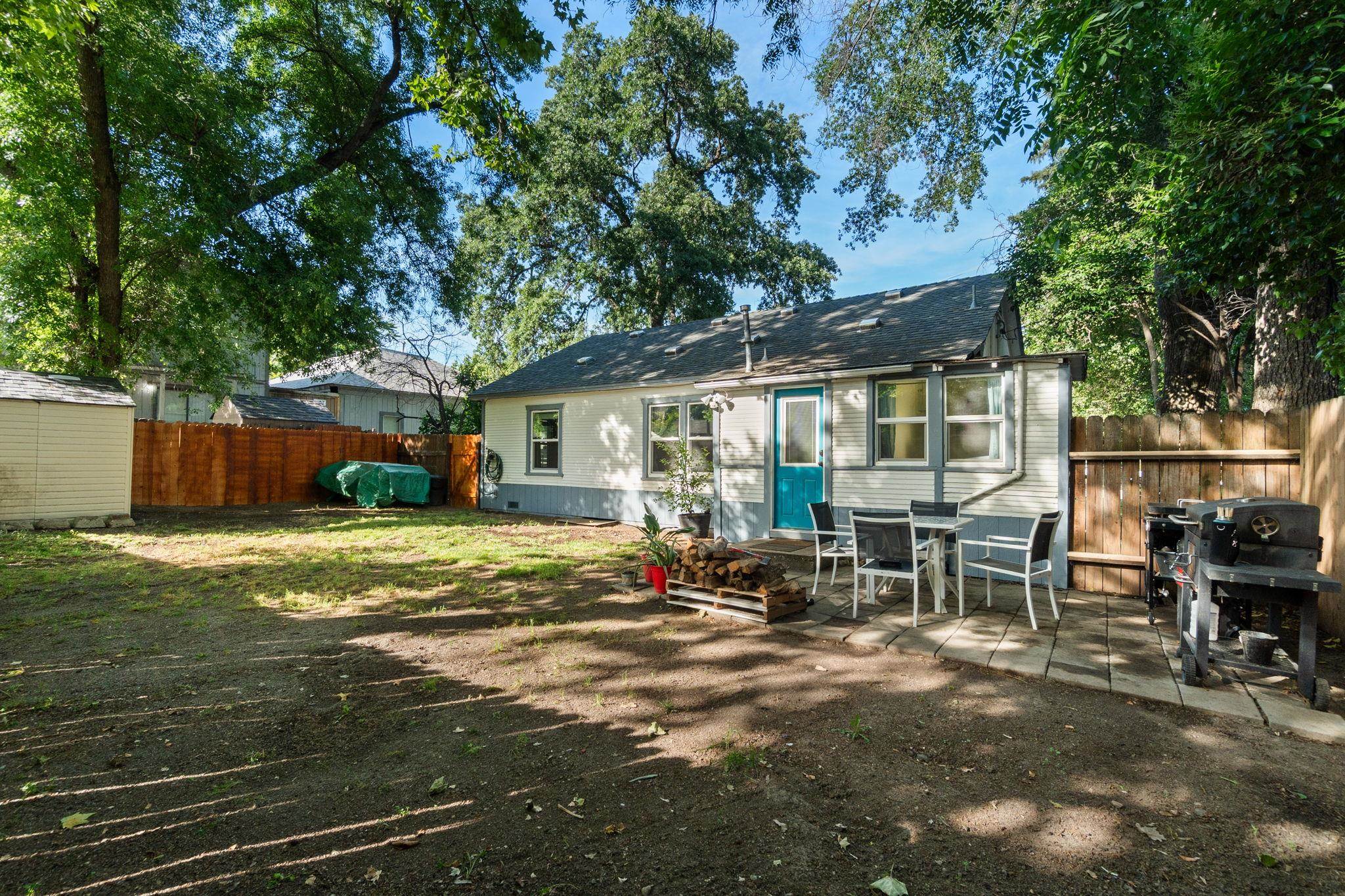355 Jackson Street Red Bluff, CA 96080 - Photo 16 of 24 a view of a house with backyard and sitting area