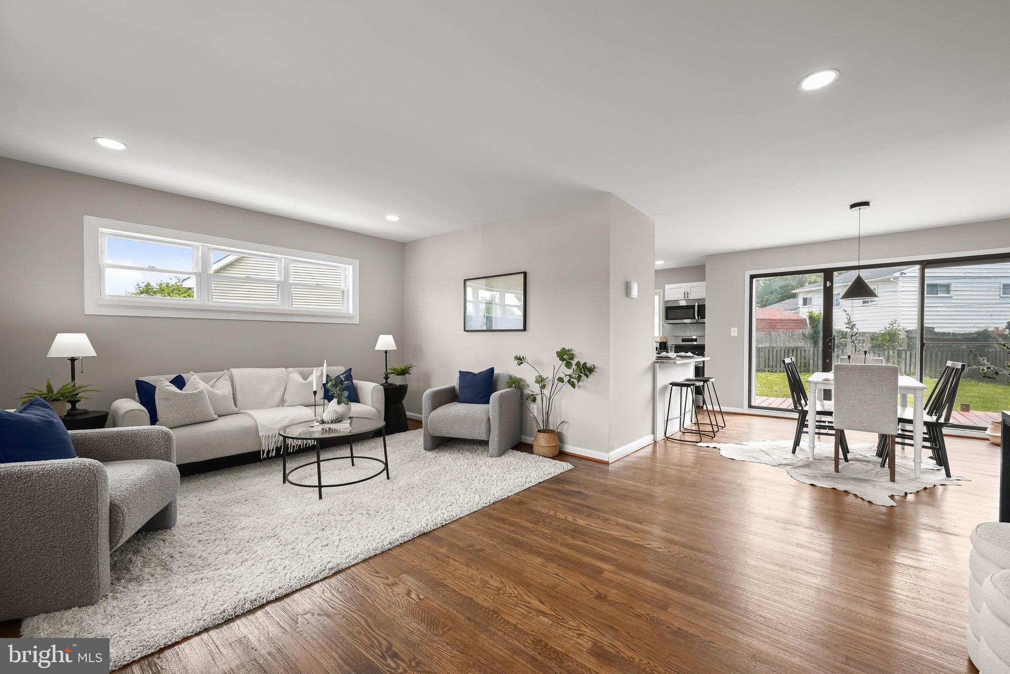 6035 Moorehead Road Baltimore, MD 21228 - Photo 41 of 43 Sun filled open floor plan with hardwood flooring